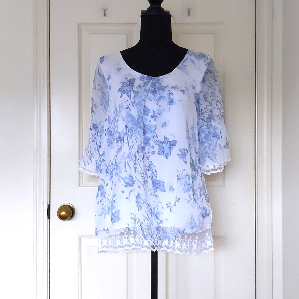 Made in Italy 100% Silk Blue Floral and Lace edge Blouse with half wide sleeve.